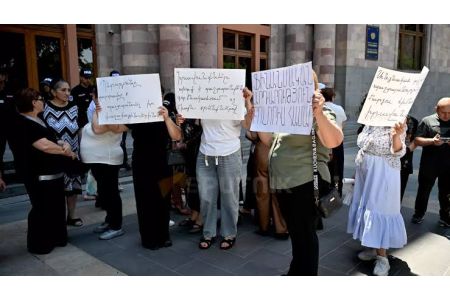 Victims of cybercrime and financial fraud protest outside Armenian Government building